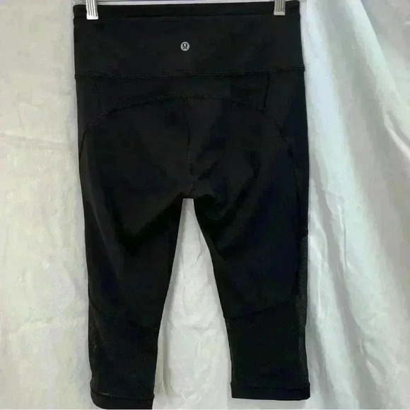 lululemon athletica Pants - Lululemon cropped black leggings with mesh detailing.